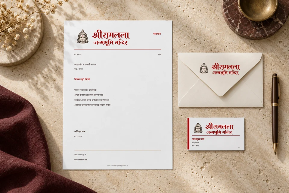 09 · लेटरहेड, लिफाफा और कार्ड · C · शिल्प मुखाकृति